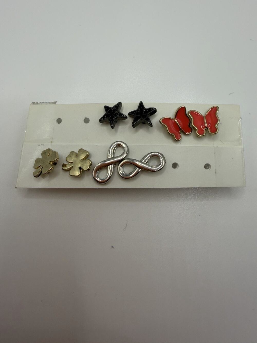 Four Pairs Of Gold & Silver Tone Stud Earrings Butterfly Star Clover Infinity